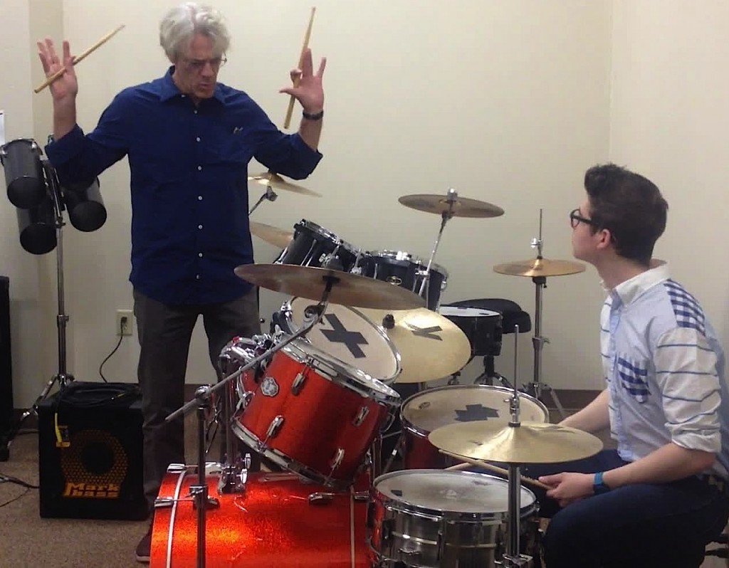Photo by Tim Kane World-renowned drummer and composer Stewart Copeland expresses the importance of mastering the paradiddle rudiment to his student Chris Barry at Eagle Hill School in Hardwick last Thursday.