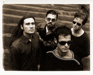 Shudder to Think in the early ’90s. From left: bassist Stuart Hill, guitarist Nathan Larson, singer Craig Wedren, drummer Adam Wade